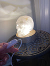 Clear Quartz Hand Carved Skull 1.64 lbs on Light Up Stand